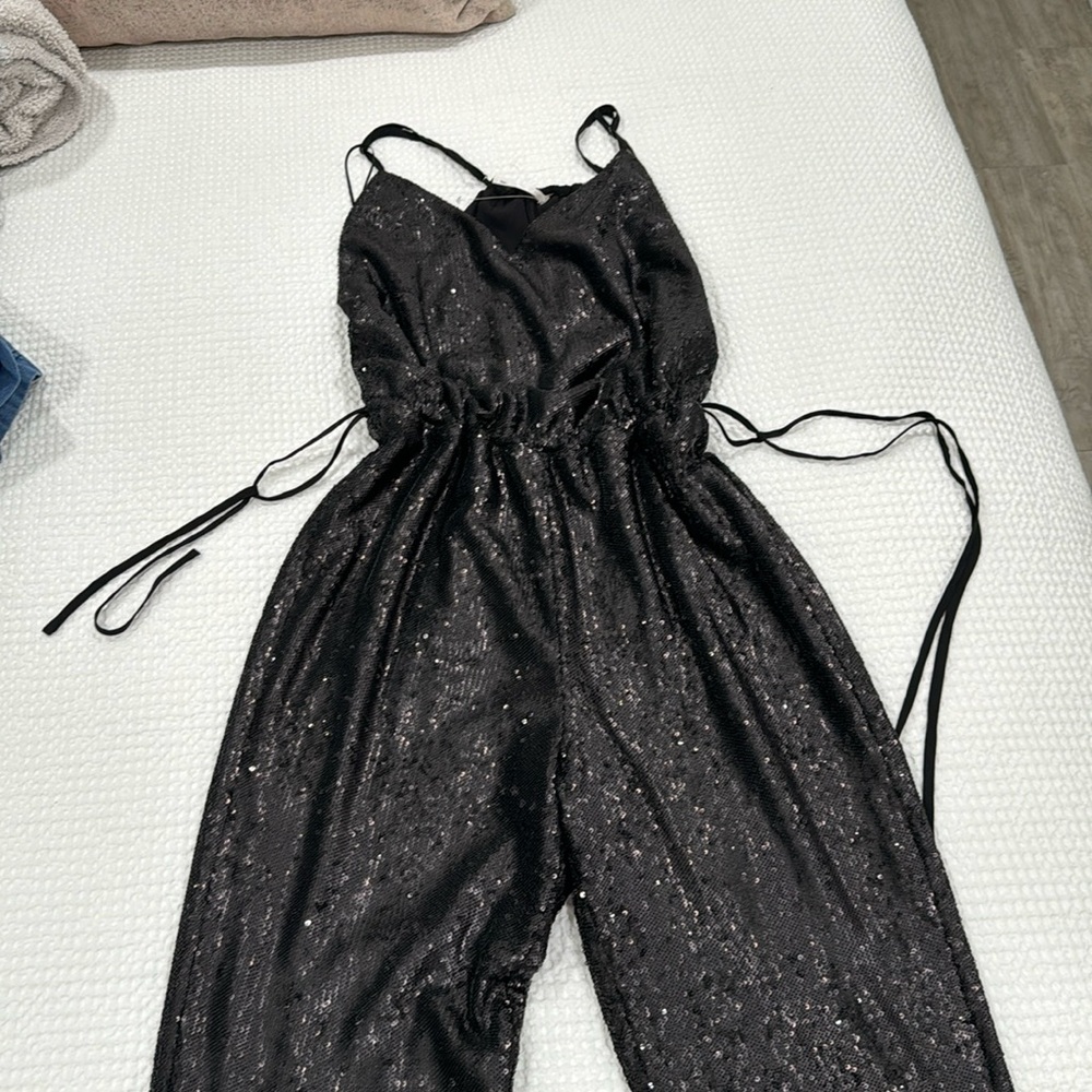 Black sparkly romper - FREE PEOPLE